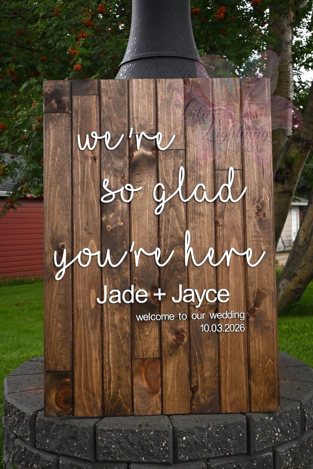 Custom wooden wedding sign with personalized raised lettering and stained wood background for ceremony décor