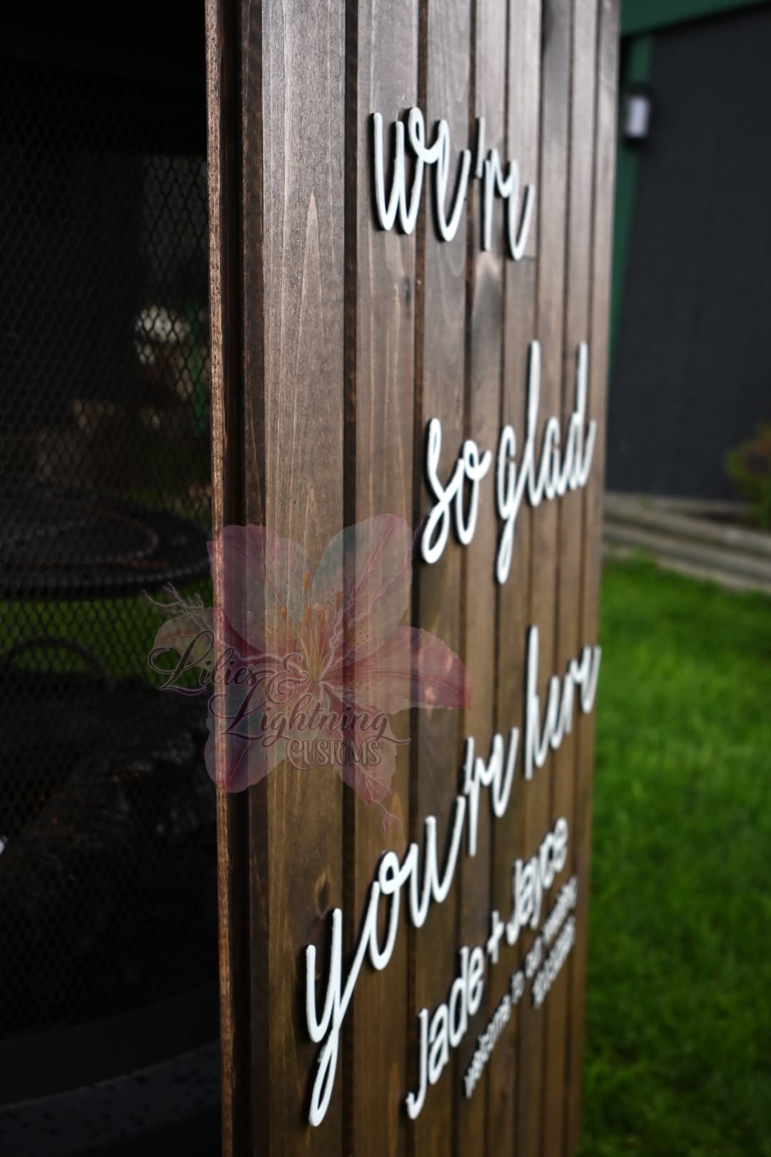 Custom wooden wedding sign with personalized raised lettering and stained wood background